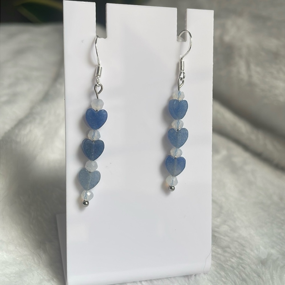 Blue heart dangle earrings with light catching accent beads. 925 silver hooks
